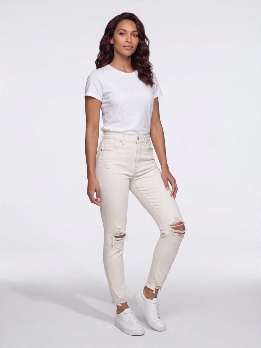 American Eagle Outfitters High-Rise Ripped Skinny Jeans in Cream